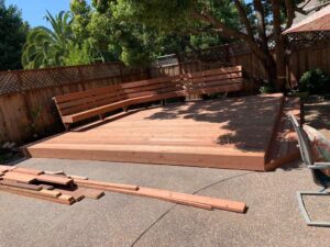 Deck framing under construction with tools and materials on site in Sonoma County